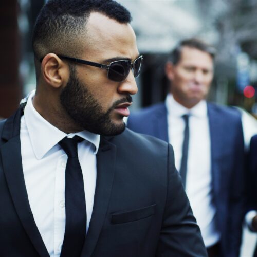 Bodyguard, walking and security for business people, protection and vip guests in city with surveil
