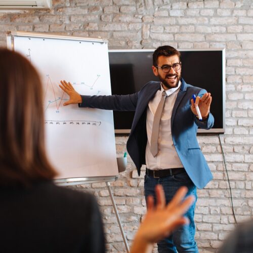 Business man making a presentation at office.