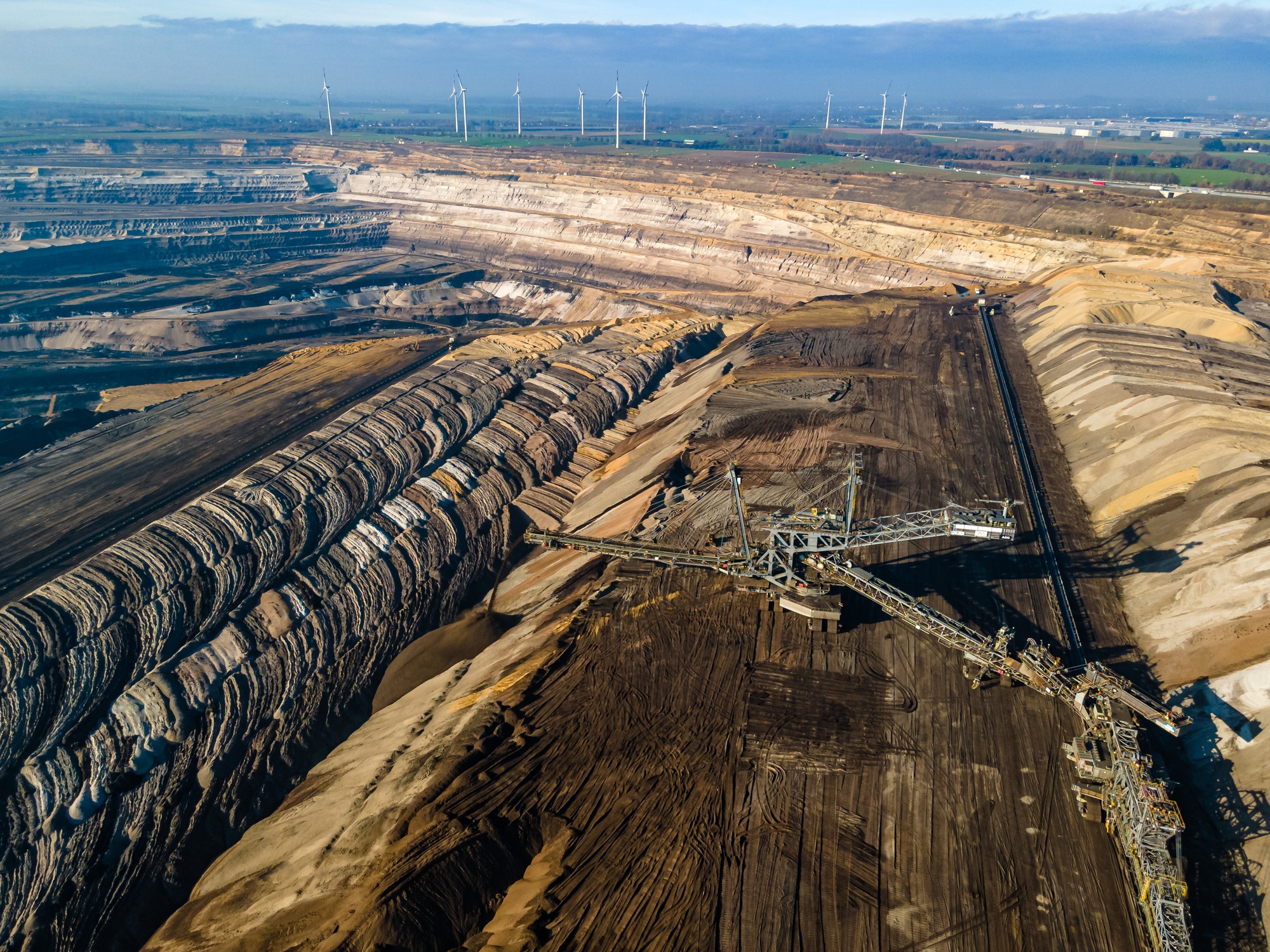 Mining equipment in a brown coal open pit mine near Garzweiler, Germany. Aerial View